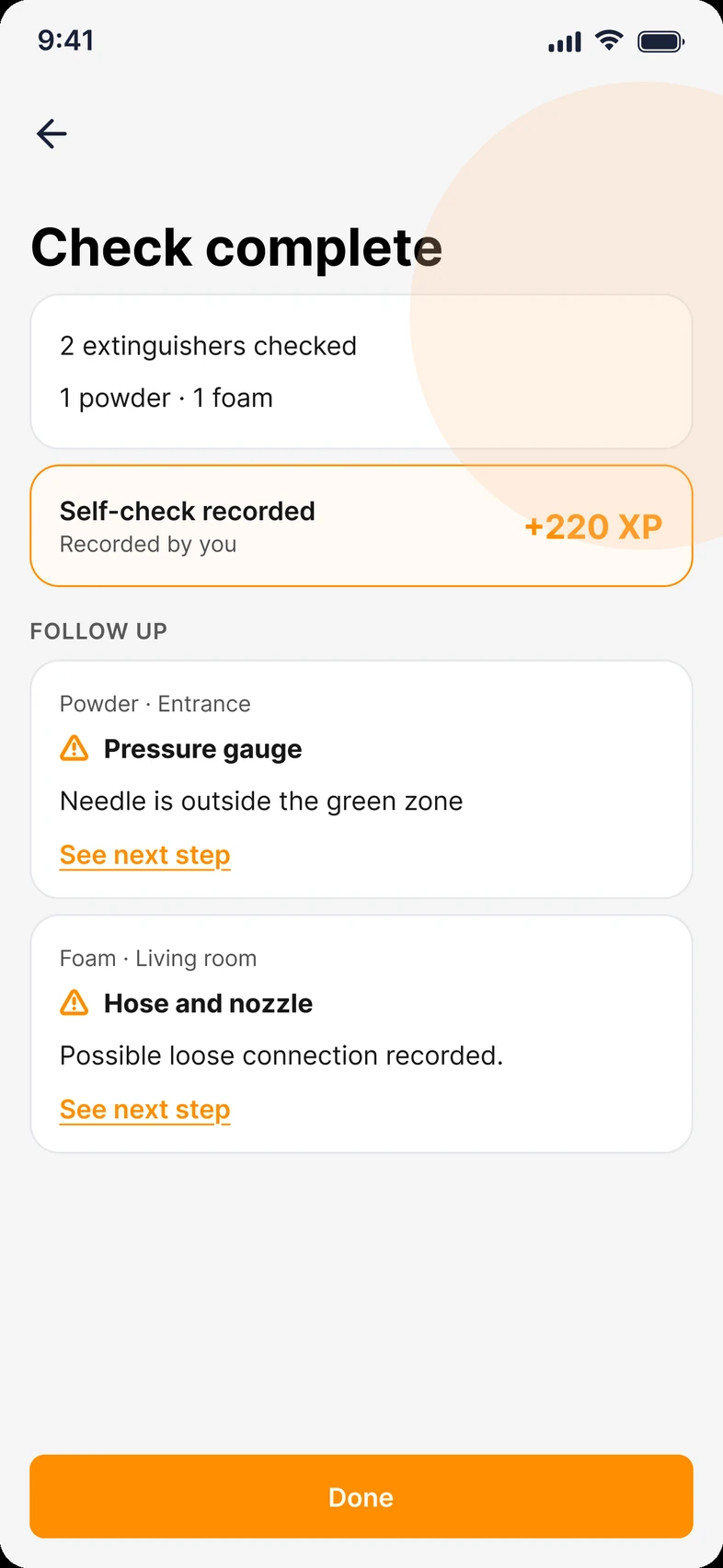 Check complete in FireHub Personal on the phone: two extinguishers checked.