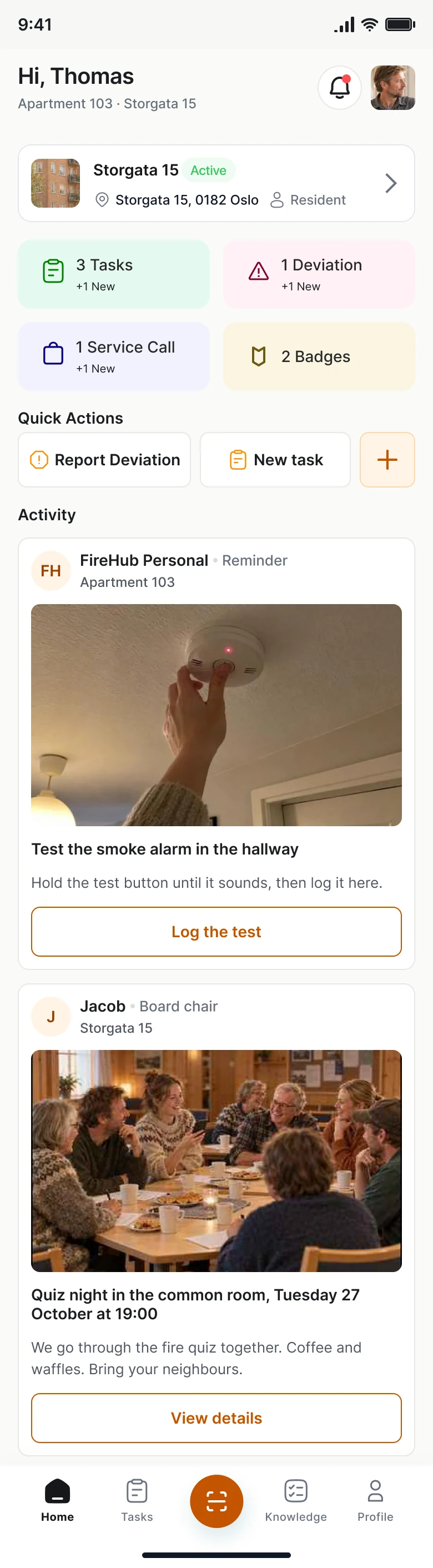 The home feed in FireHub Personal on the phone: the flat in Storgata 15 and the smoke alarm reminder.